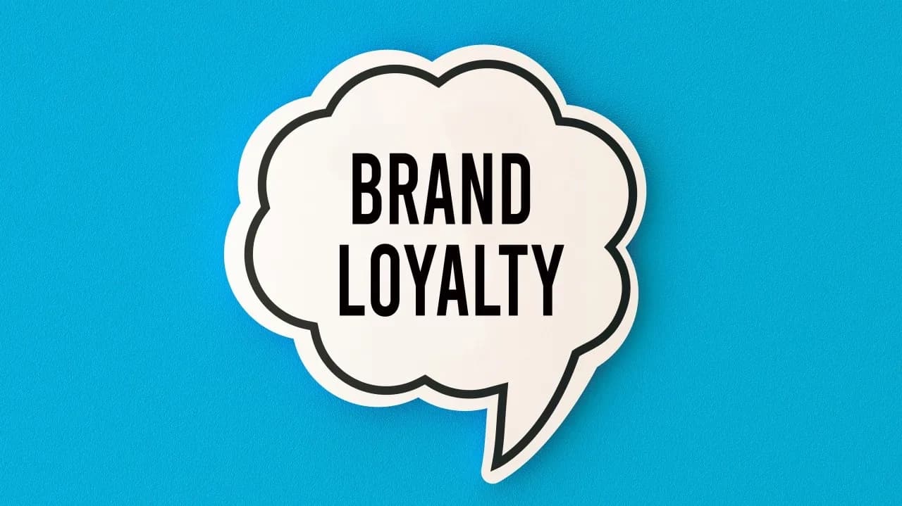 Speech-bubble sticker reading Brand Loyalty on a bright blue background