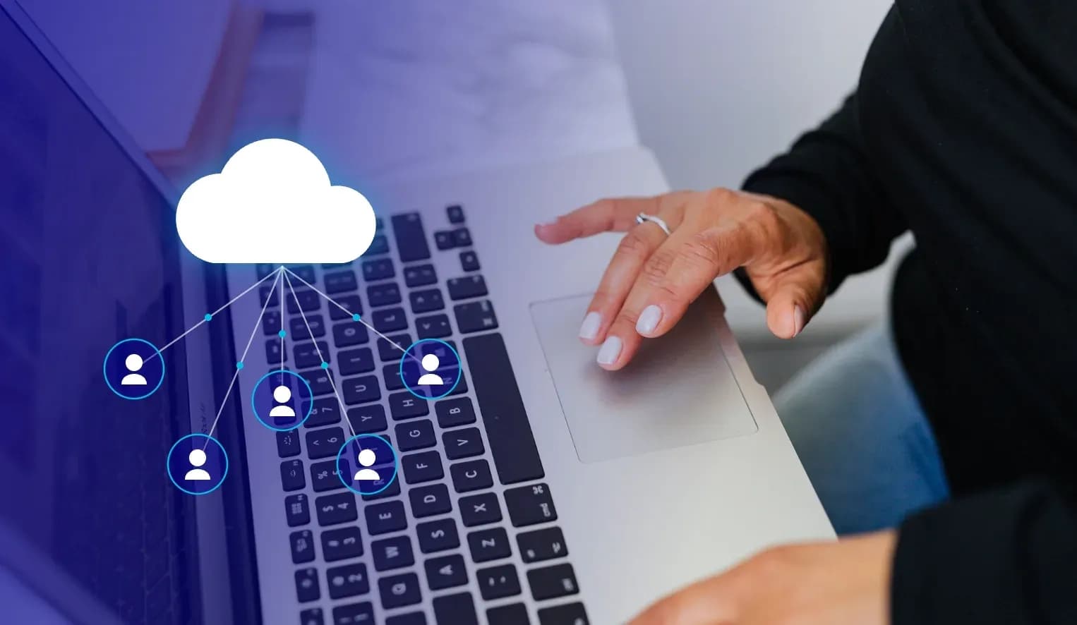 Hands on a laptop with a cloud connecting a network of referred users