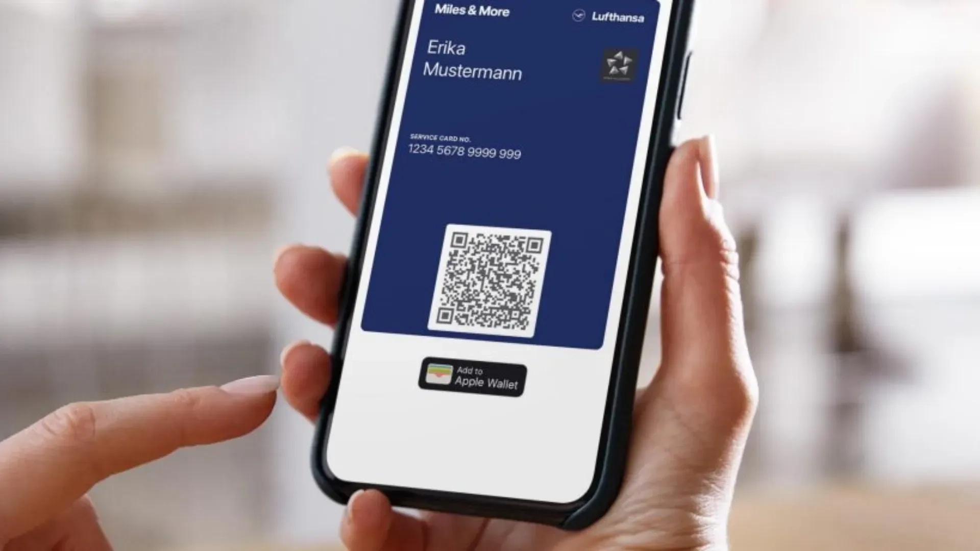 Lufthansa Miles & More digital membership card with a QR code on a phone, ready to add to Apple Wallet